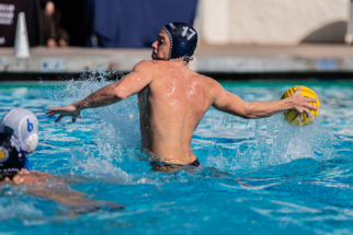 Website Photo 1 male water polo player shooting